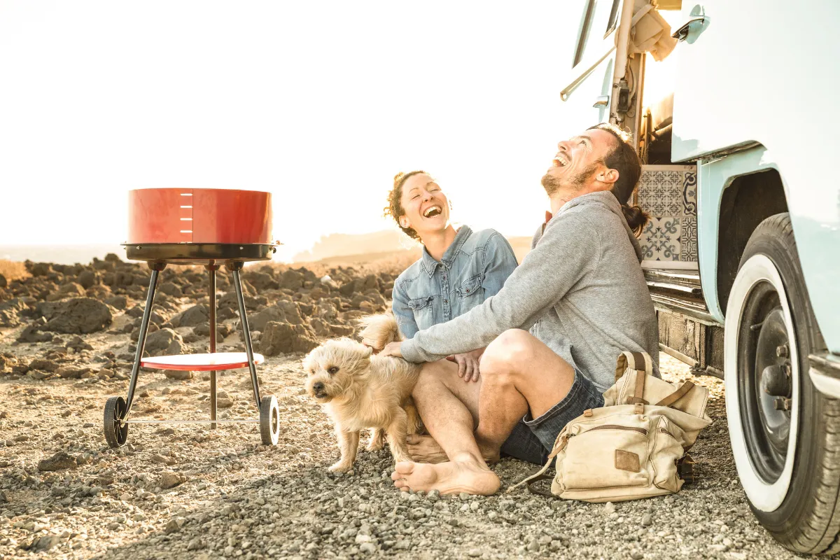 hipster-couple-with-cute-dog-traveling
