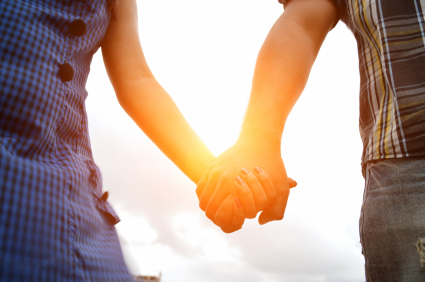 Couple holding hands